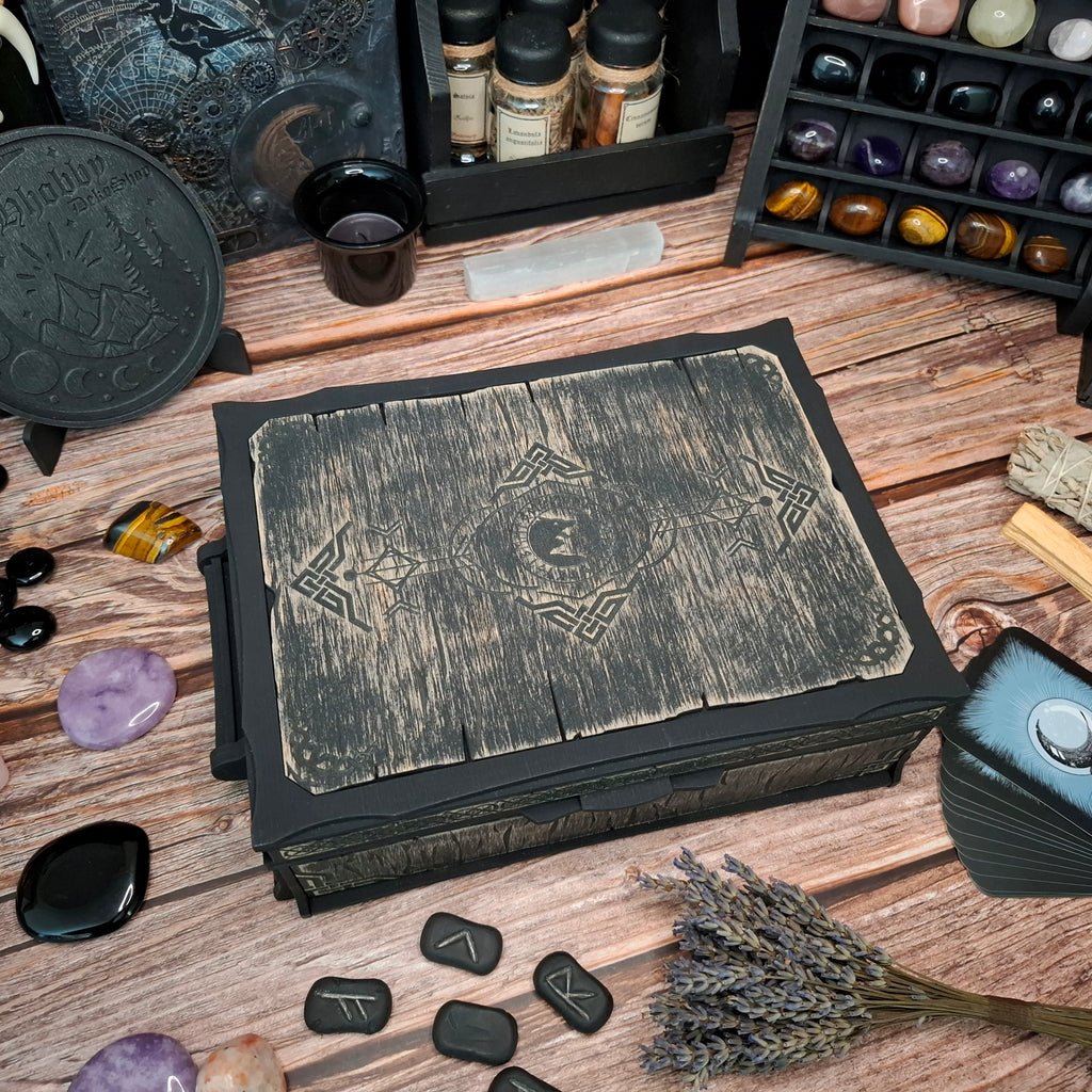 The Celtic ritual storage box displayed among crystals, runes, tarot cards, and ritual tools, bringing a timeless atmosphere to your magical space.

