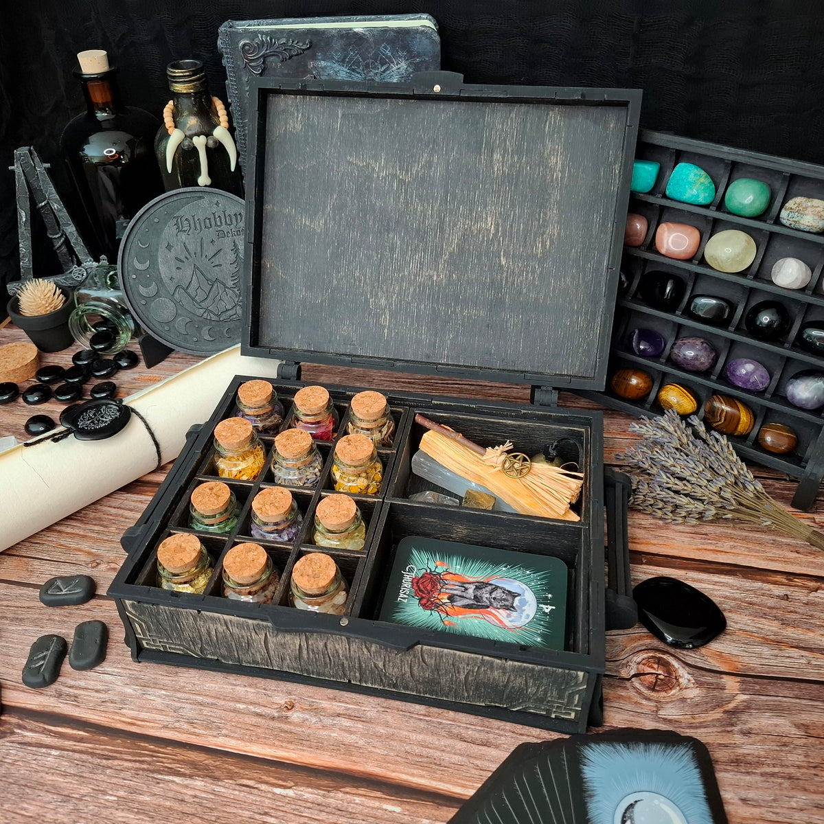 Open Celtic ritual storage box with removable compartments holding herb bottles, tarot card, and ritual tools – handcrafted wooden apothecary organizer by Enchanted Hollow
