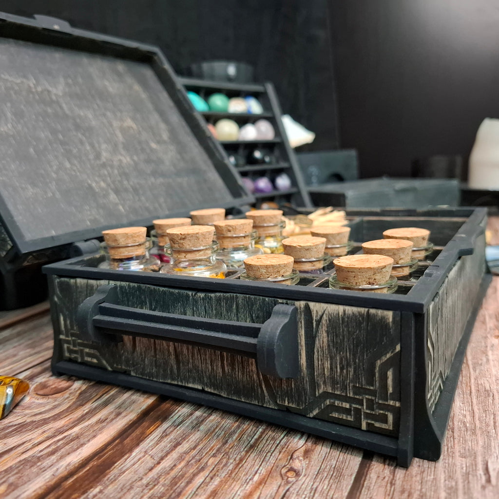 The deep lid design provides extra interior clearance, allowing taller glass bottles to fit comfortably inside the Celtic ritual storage box.
