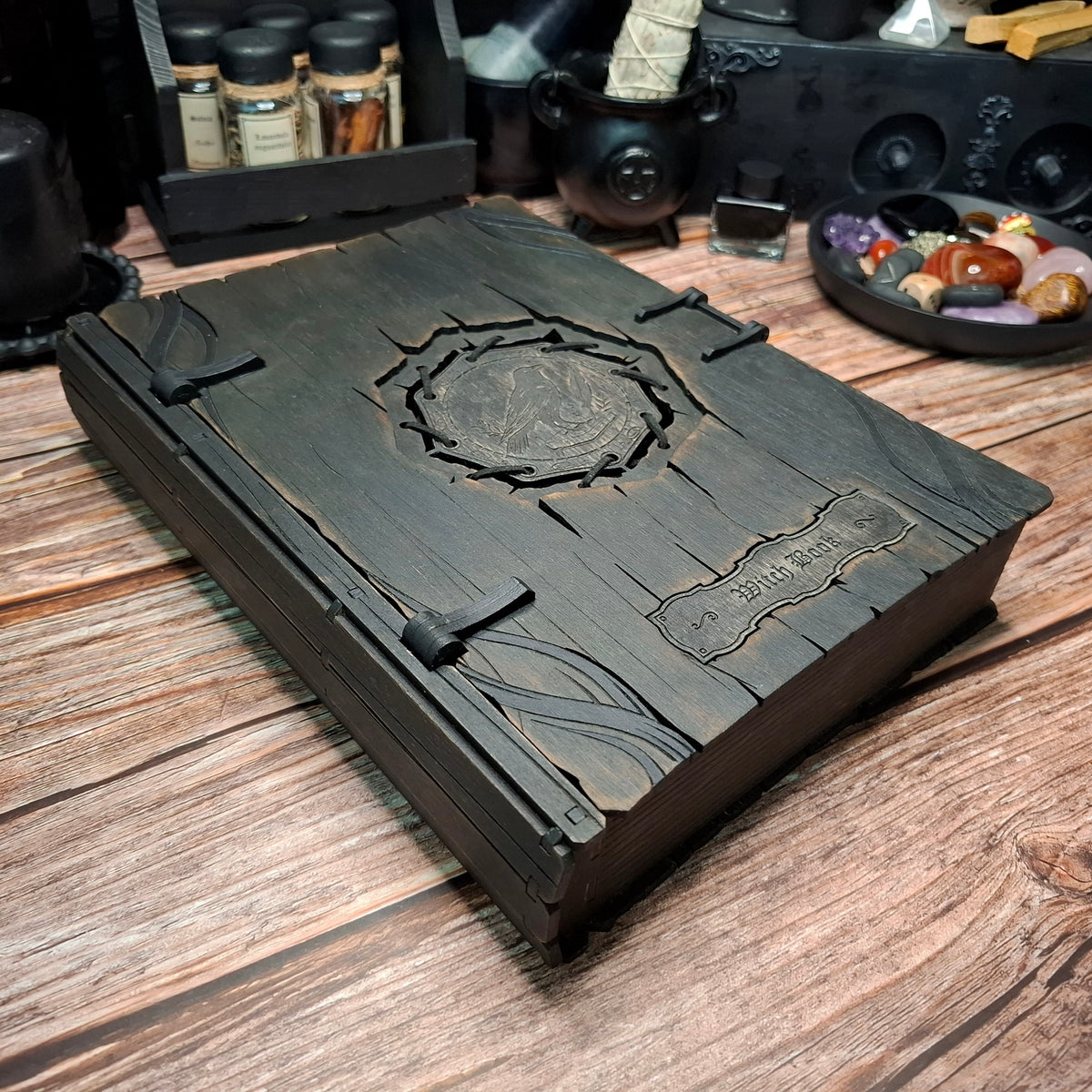 Angled view of handmade wooden raven grimoire storage box