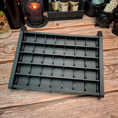 Large wooden crystal storage shelf with 7x5 compartment layout for organizing crystal collections.
