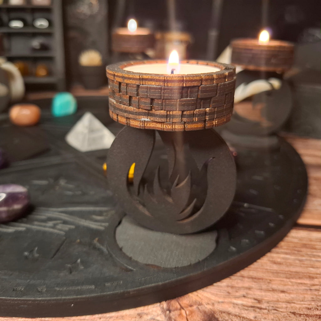 Close-up of a lit handmade wooden ritual candle holder in a mystical setting