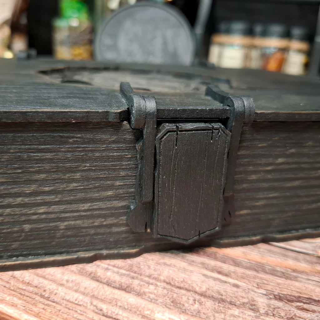 Magnetic wooden clasp detail on raven witch book box