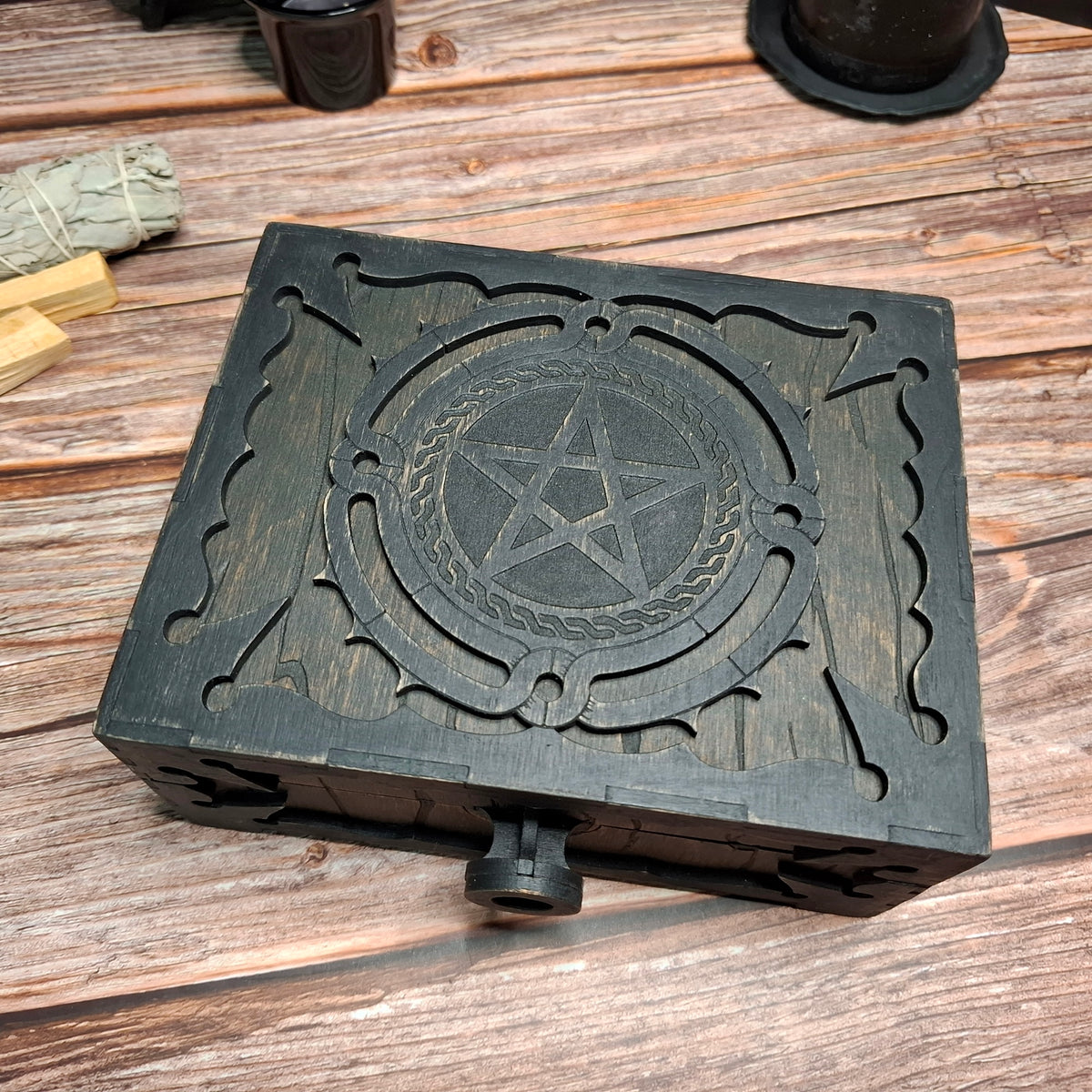 Handmade wooden pentagram ritual box viewed from an angled perspective