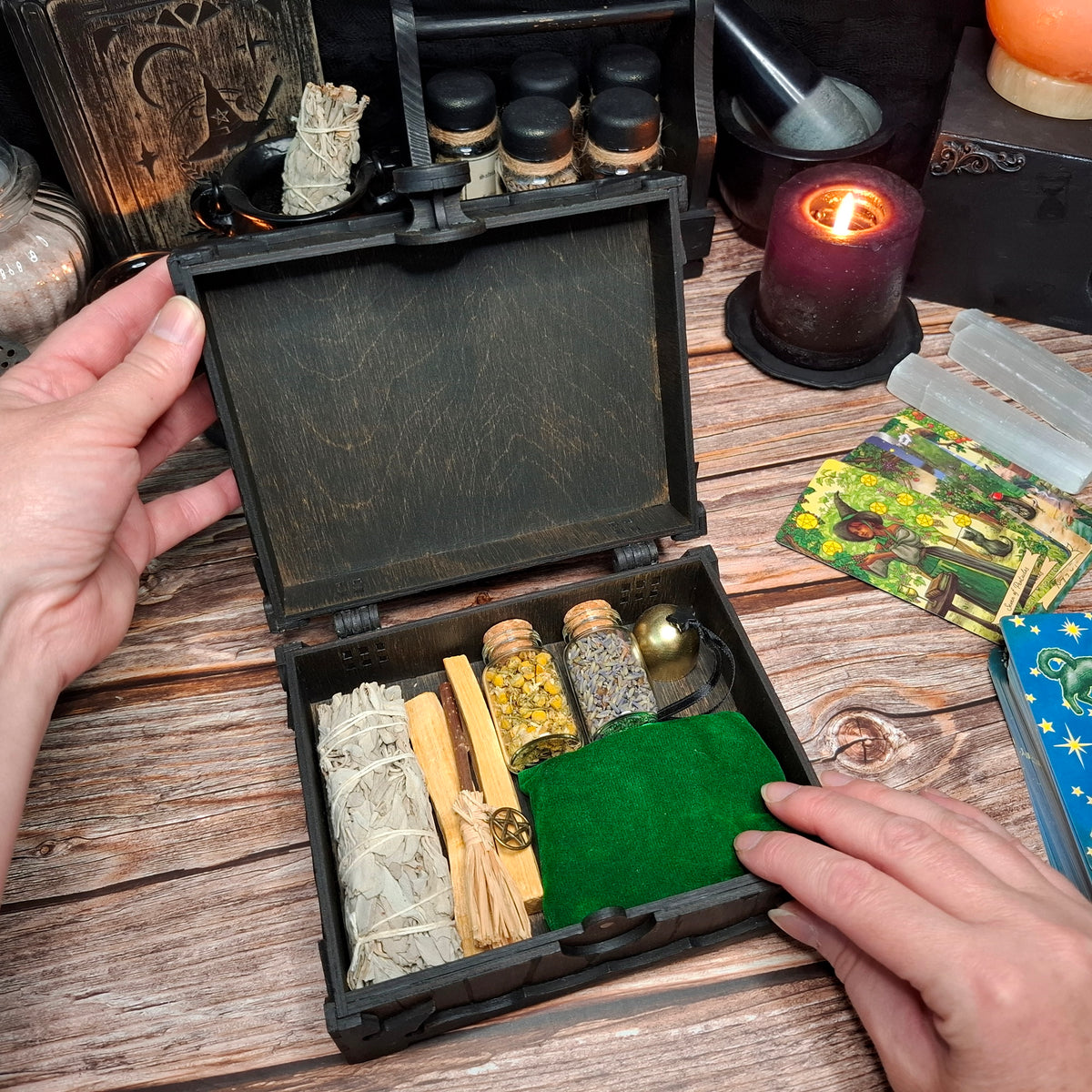 Handmade wooden pentagram ritual box filled with ritual tools, crystals and small accessories
