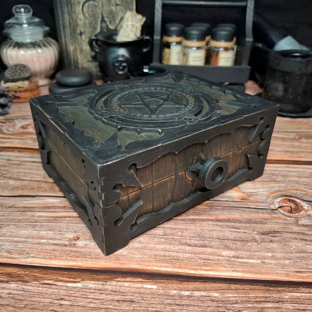 Detailed front view of a handmade wooden pentagram ritual box
