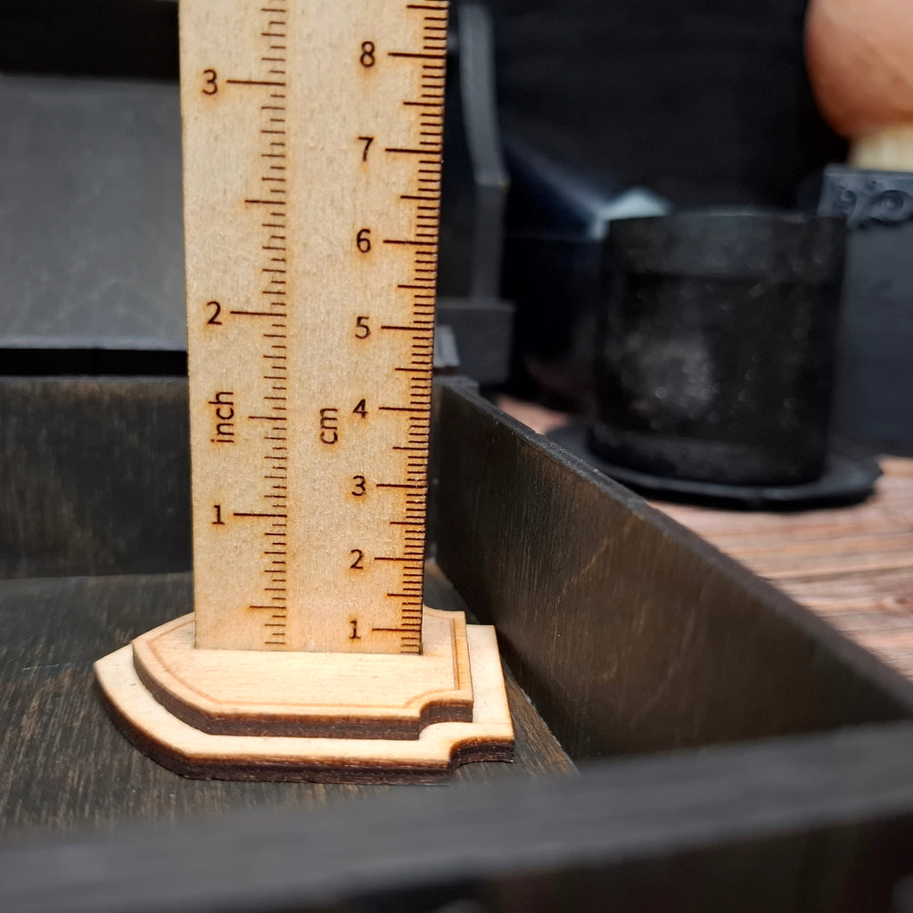 Inner storage depth measurement of a handmade wooden pentagram ritual box