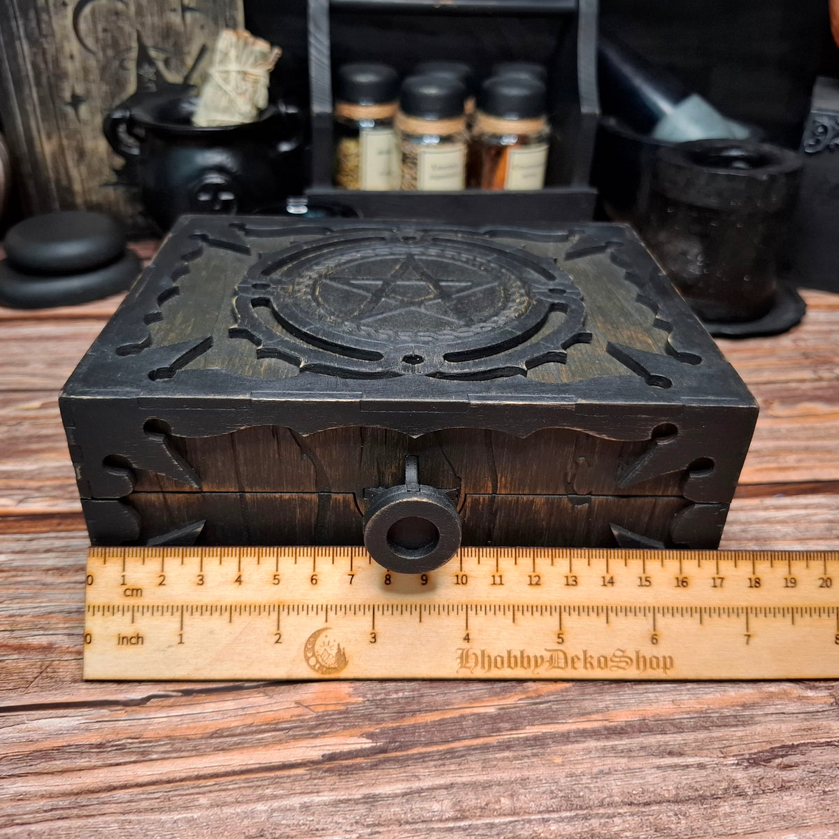 Handmade wooden pentagram ritual box shown with ruler for length measurement
