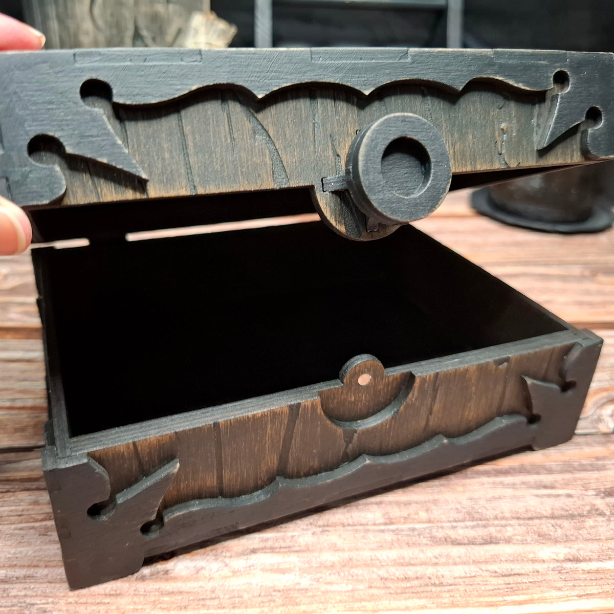 Handmade wooden pentagram ritual box opened to reveal the storage compartment