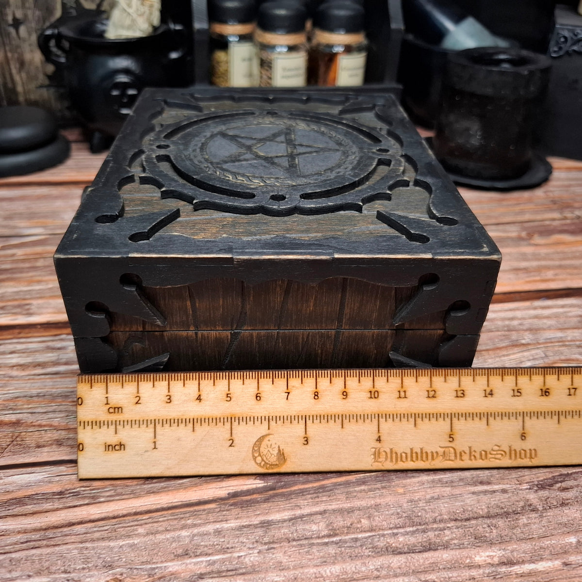 Handmade wooden pentagram ritual box shown with ruler for width measurement