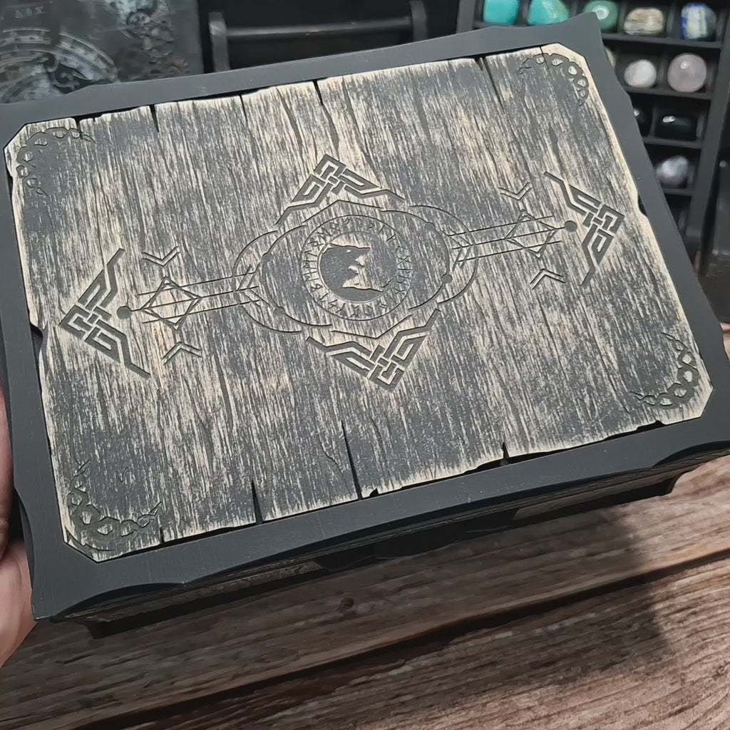 Video showing the handcrafted Celtic ritual storage box, its engraved exterior, and the smooth movement of the removable interior organizers.
