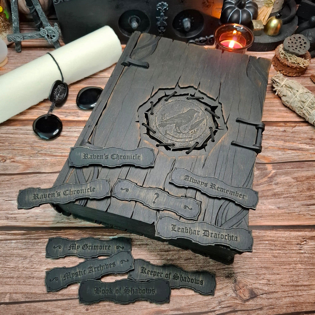Personalizable raven book box with a selection of pre-designed nameplate options, allowing you to choose the title that best matches your magical book.