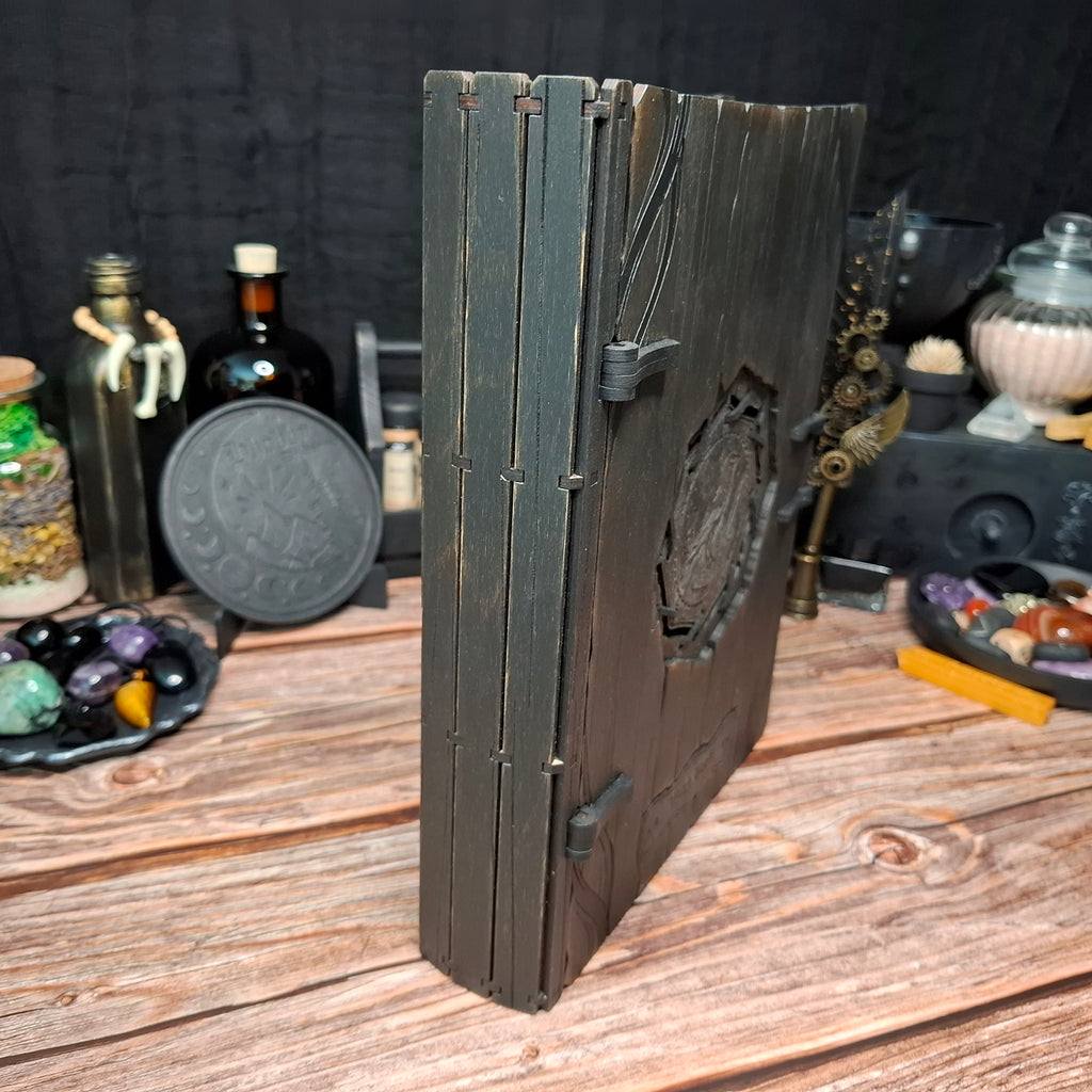 Side and spine view of handmade raven witch book box