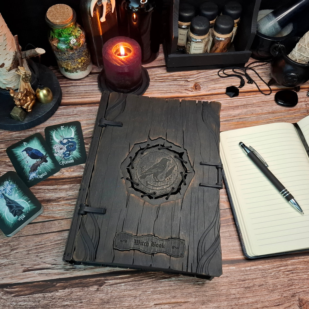 Dark aesthetic raven grimoire box displayed in a mystical altar-inspired setting