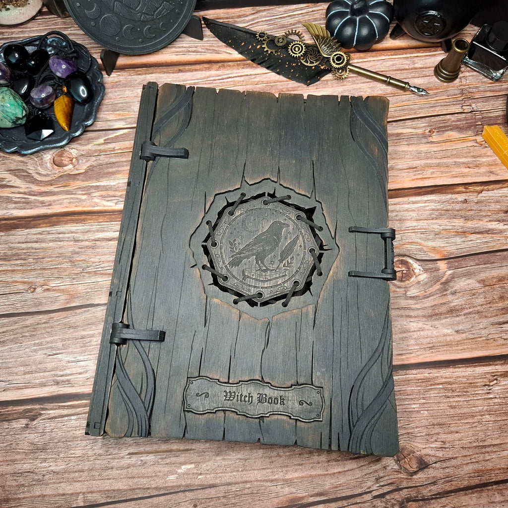 Handmade raven witch book box with engraved wooden grimoire cover