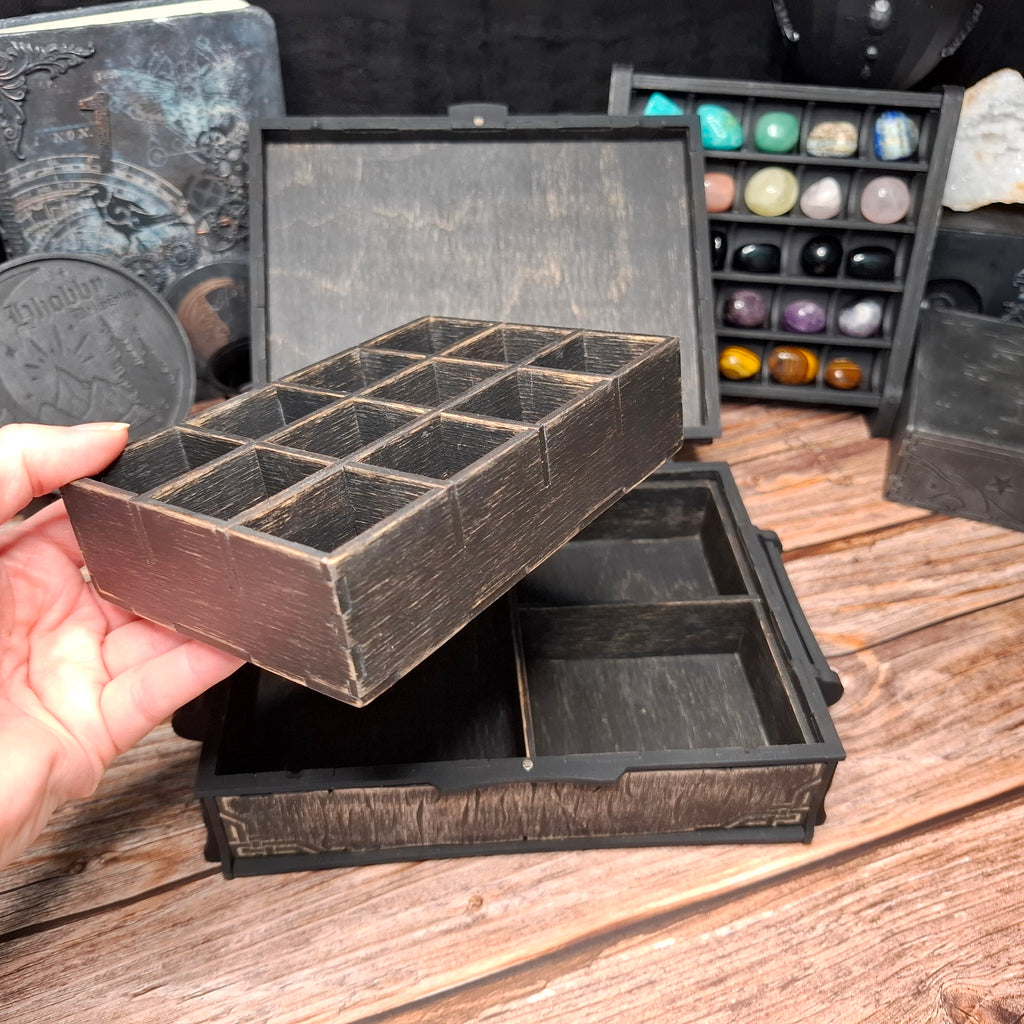 One of the removable interior organizers, designed to keep crystals, herbs, small bottles, and ritual supplies neatly arranged inside the Celtic ritual storage box.
