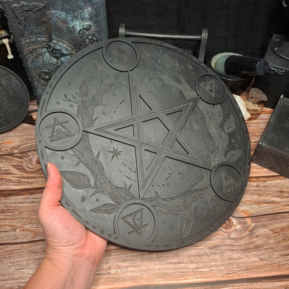 Handmade wooden ritual altar tray shown in hand for scale reference