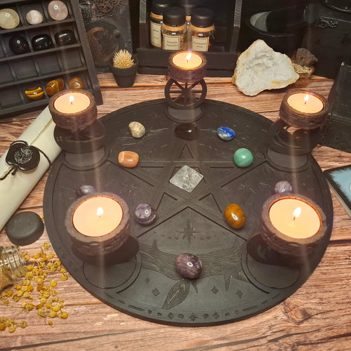 Handmade wooden ritual altar tray with pentagram design, tea light candle holders and crystals arranged for a mystical ritual setting