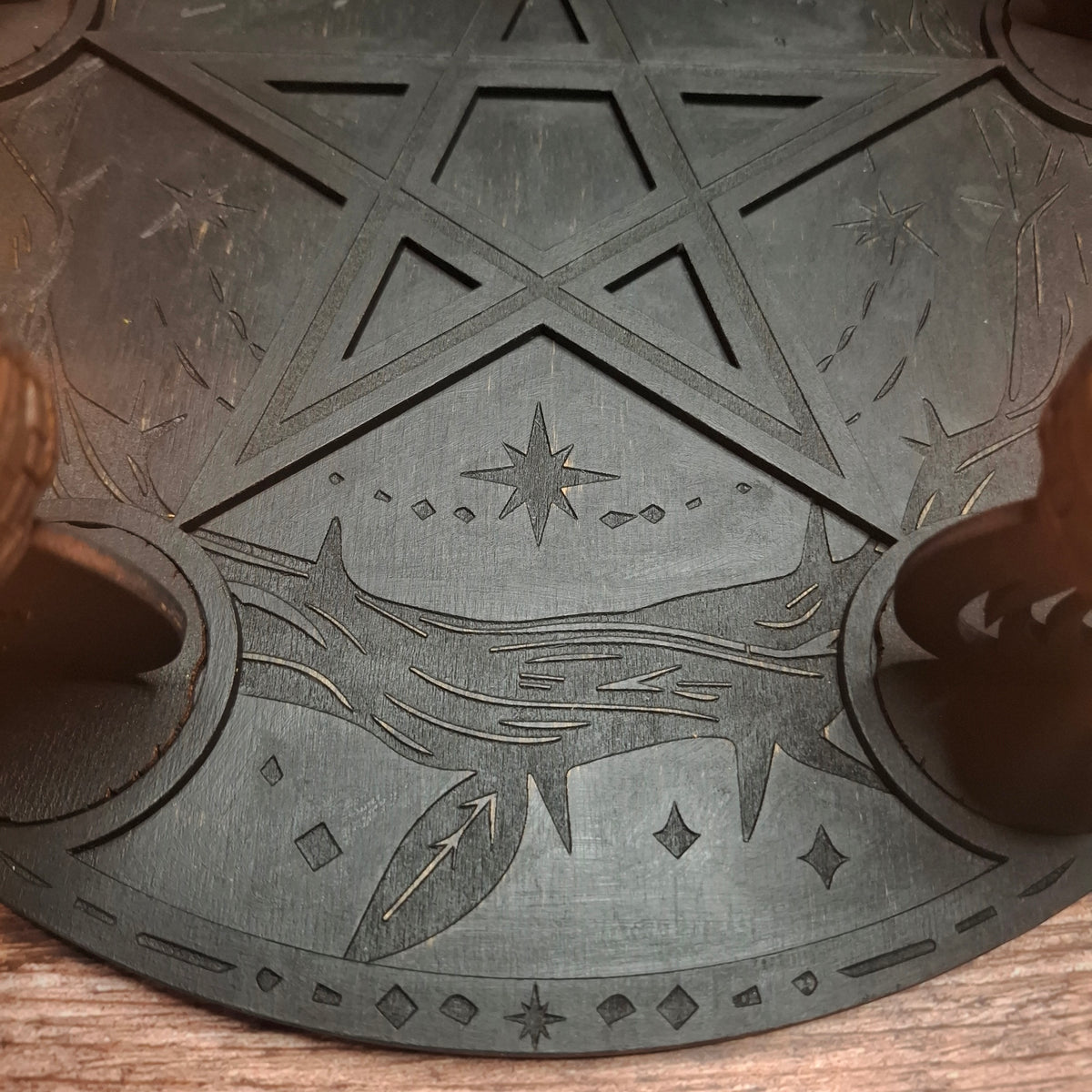 Detailed surface engraving on a handmade wooden ritual altar tray with pentagram motif