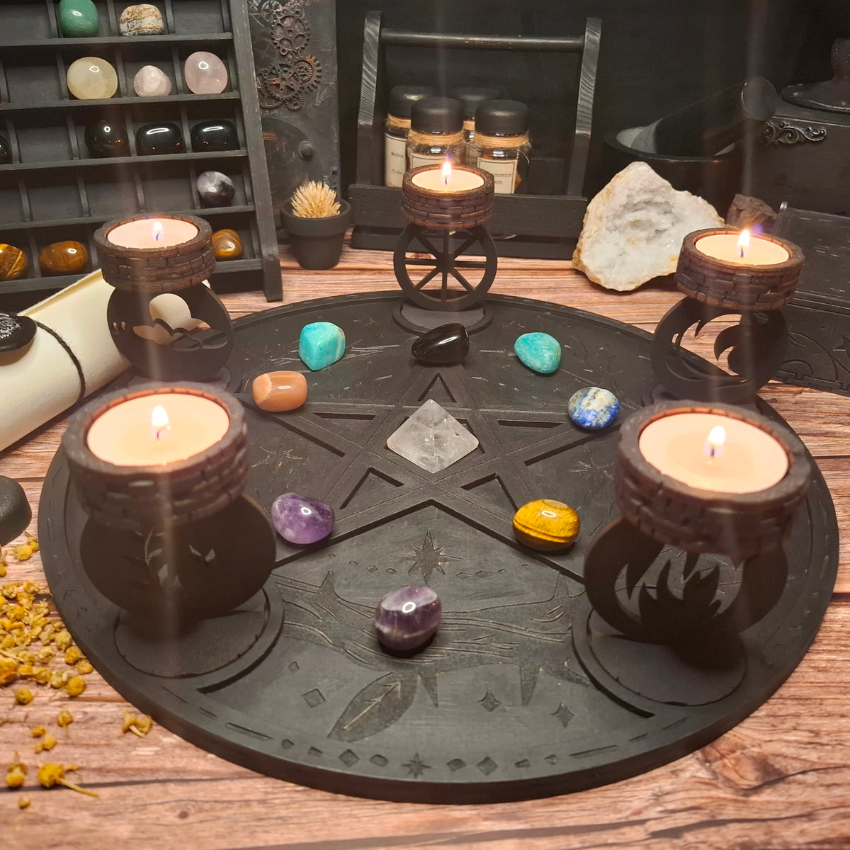 Wooden ritual altar tray arranged with crystals, tea light candles and elemental candle holders