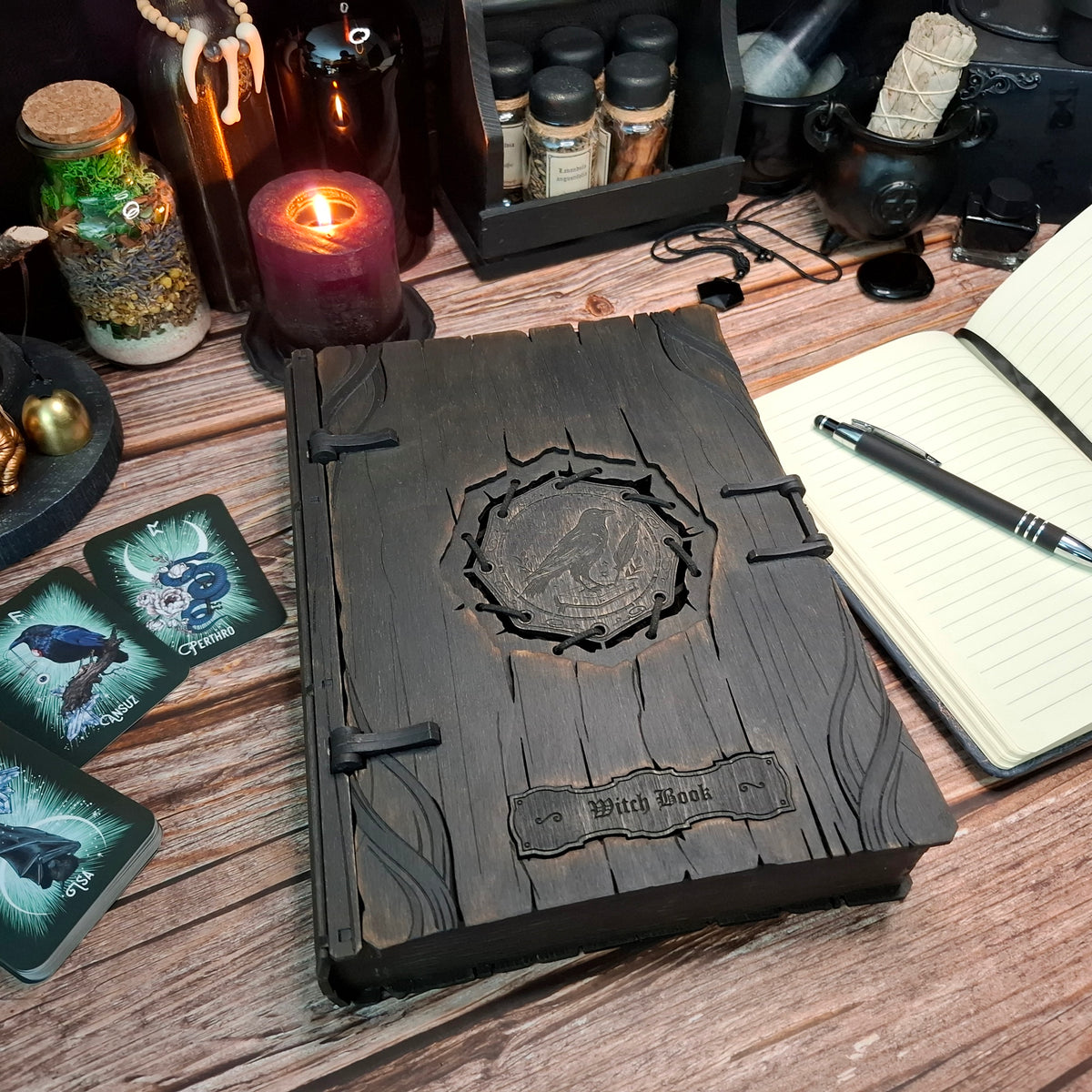 Wooden witch book storage box photographed in a mystical ritual-inspired tabletop scene