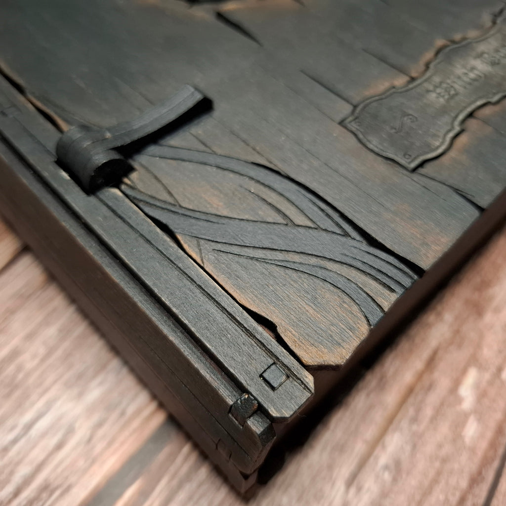 Corner detail of handcrafted wooden grimoire storage box